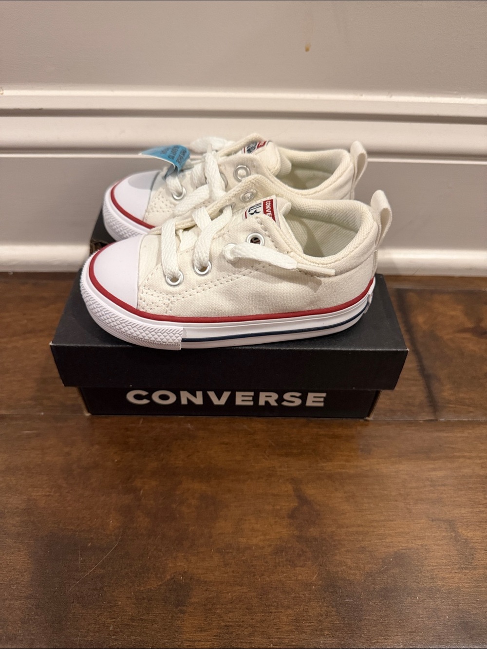 Converse Kids Low Top Canvas Sneakers in White with Red Stripe